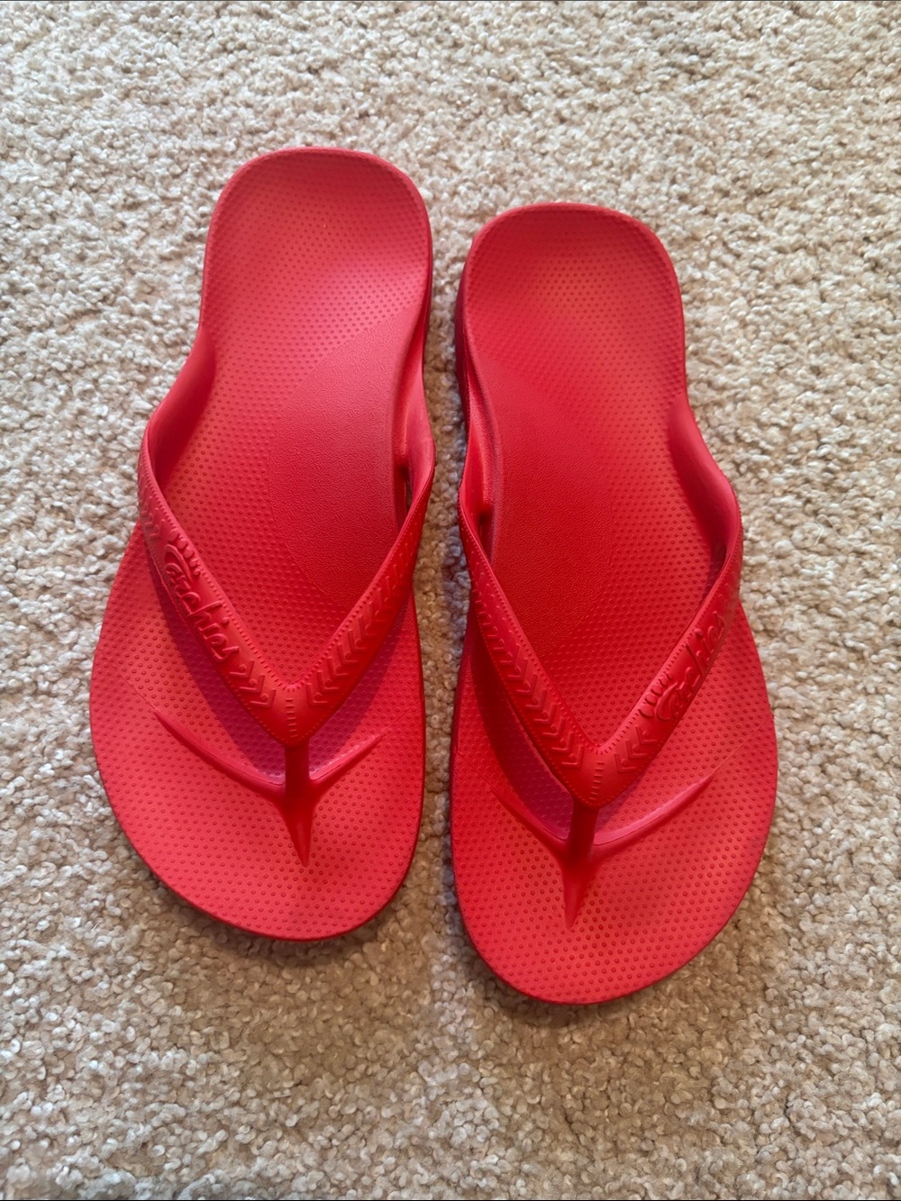 Archie’s flip flops